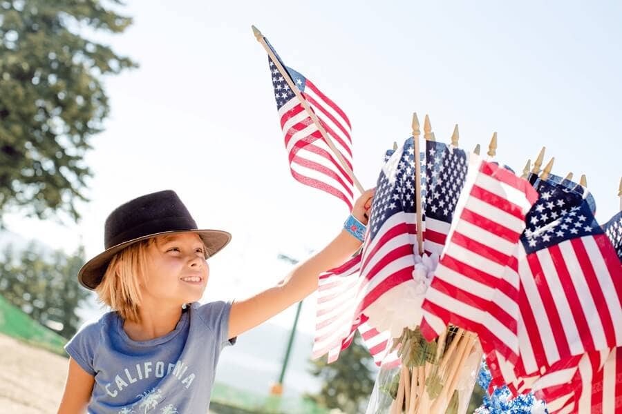 4th of july american flags with kid